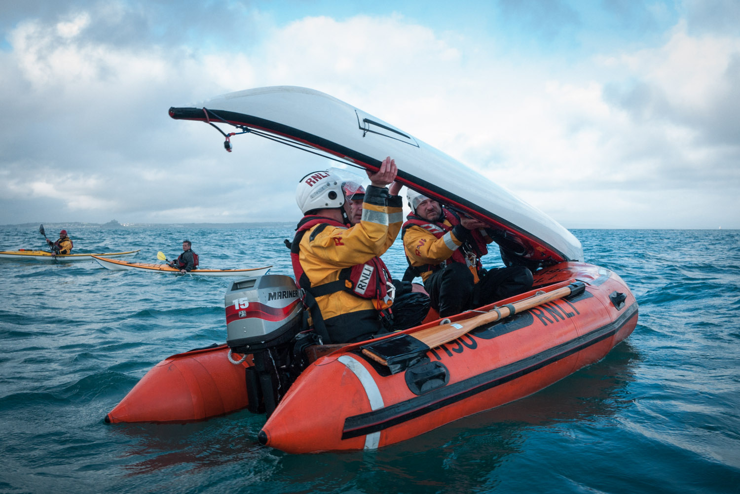 handling an 18ft kayak in a 12ft boat somewhat awkward at times