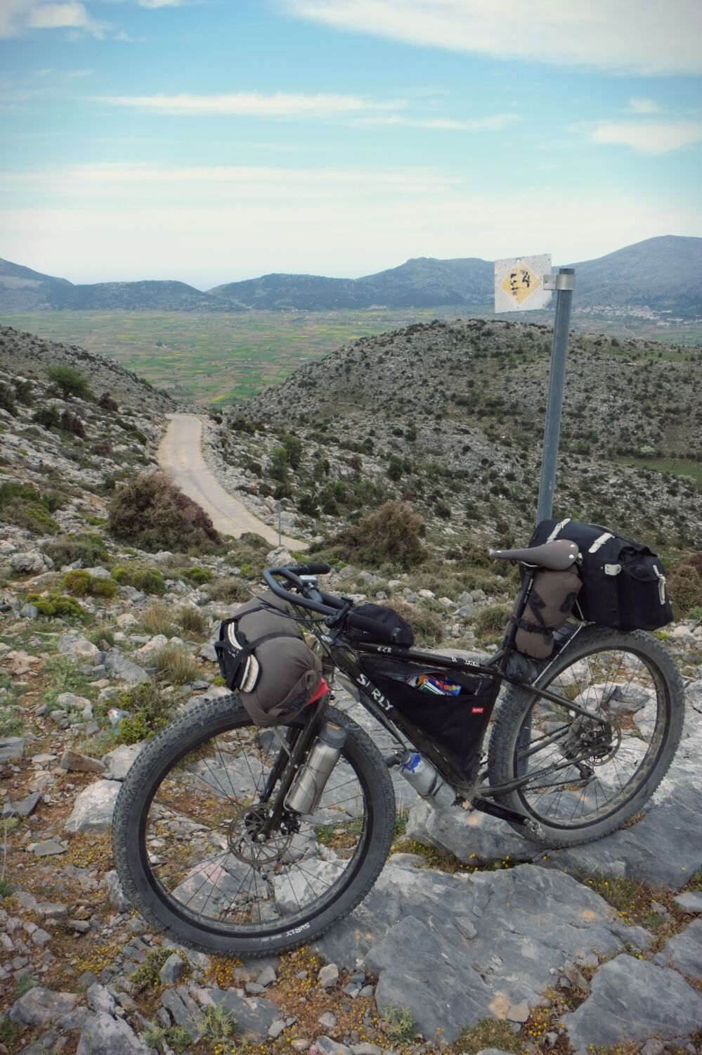 E4 trail marker above the Lasithi Plateau (background)