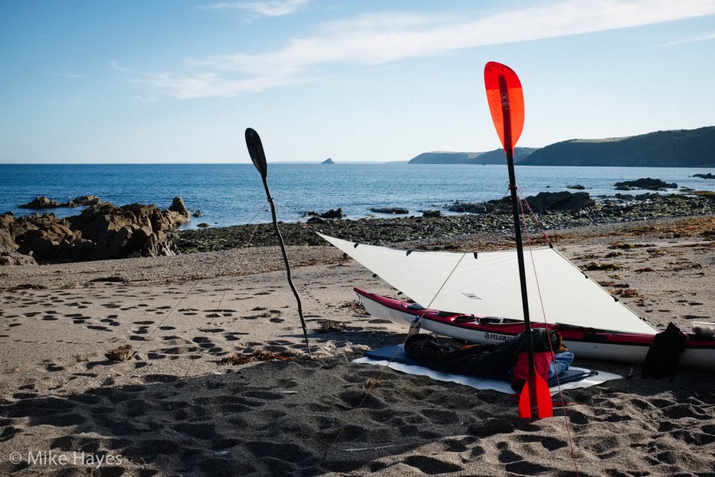 My quite old and well-used Integral Designs Siltarp makes a great shelter for one with the addition of a kayak and couple of paddles. It was a peaceful night, although amusingly beset with hundreds of sandhoppers that night, jumping around over my arms and head.. they don't bite.. at least they don't bite me, so it wasn't a problem.