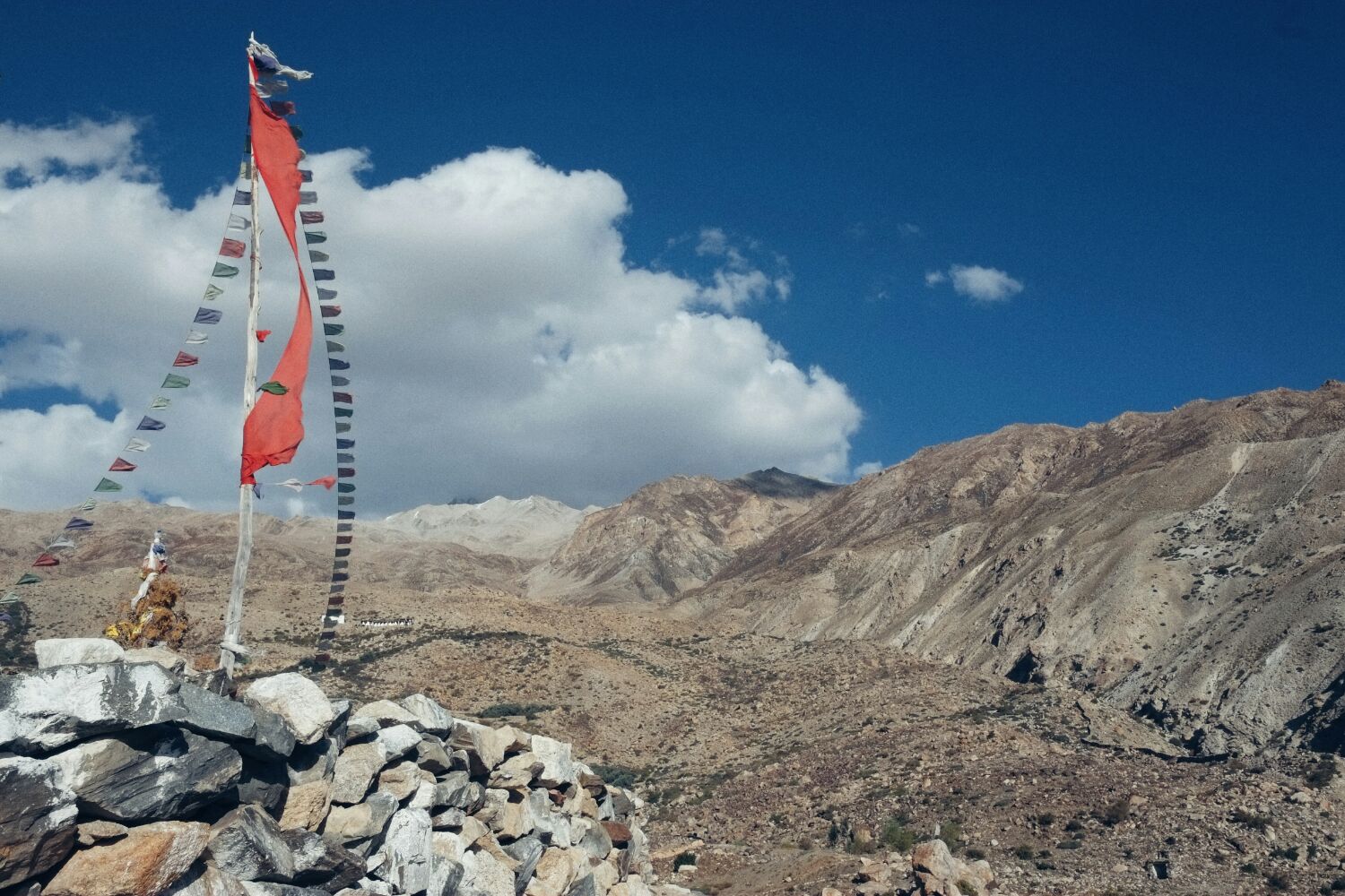 Prayer flags adorn the mountains. It is always windy.