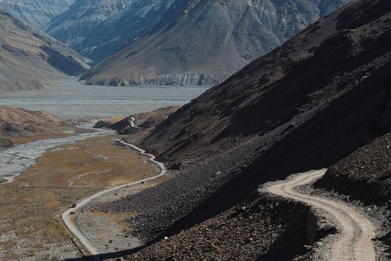The lower slopes of the Kunzum La. It is not a difficult climb, mostly hardpacked dirt with just a few spots of mud and loose rock to negotiate. It climbs just 500m or so in 11km, with only a few very steep sections. Looking back down the climb was also my final view of the rather wonderful Spiti Valley.