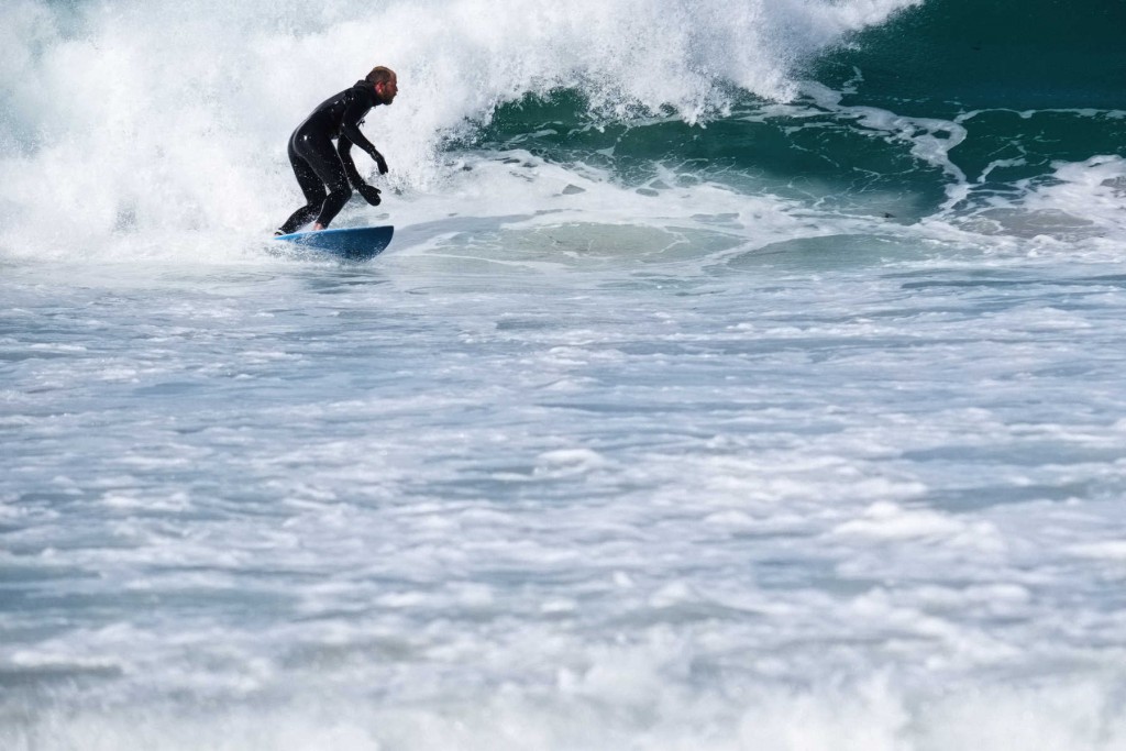 I have fond memories from my last visit of the slightly out of context experience getting changed into my wetsuit at the airport terminal before jumping over the dunes into the surf :-)