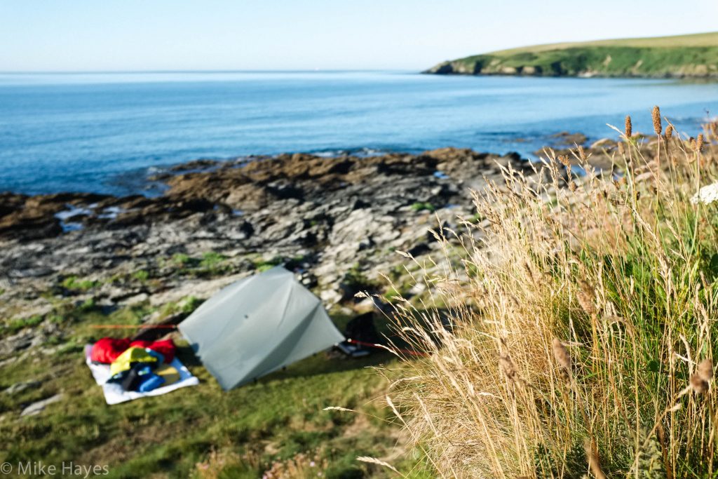 I needed my tarp with the heavy dew fall but with the sun showing its face I moved my bed outside for a few more ZZzs while Mark tried to catch breakfast...