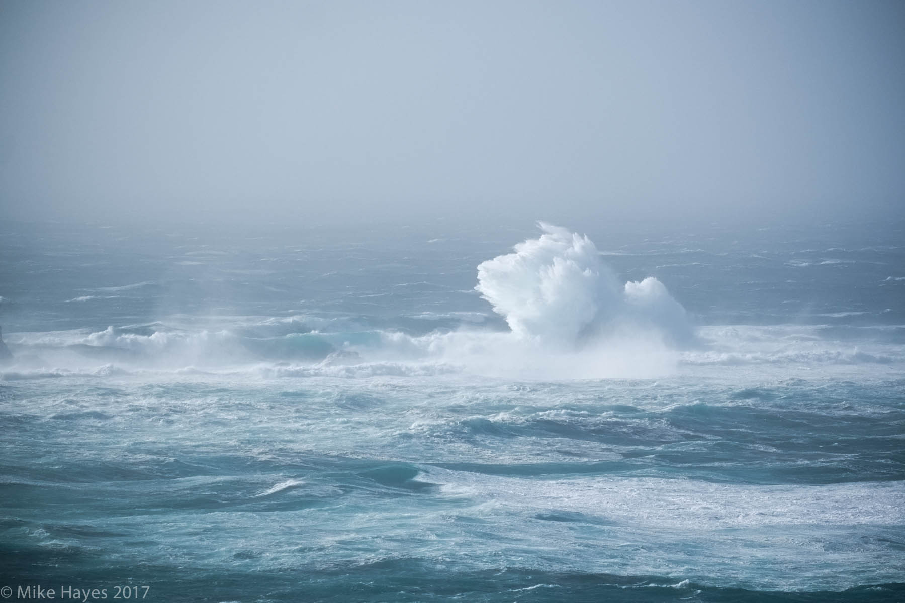 Longships Lighthouse in a winter storm