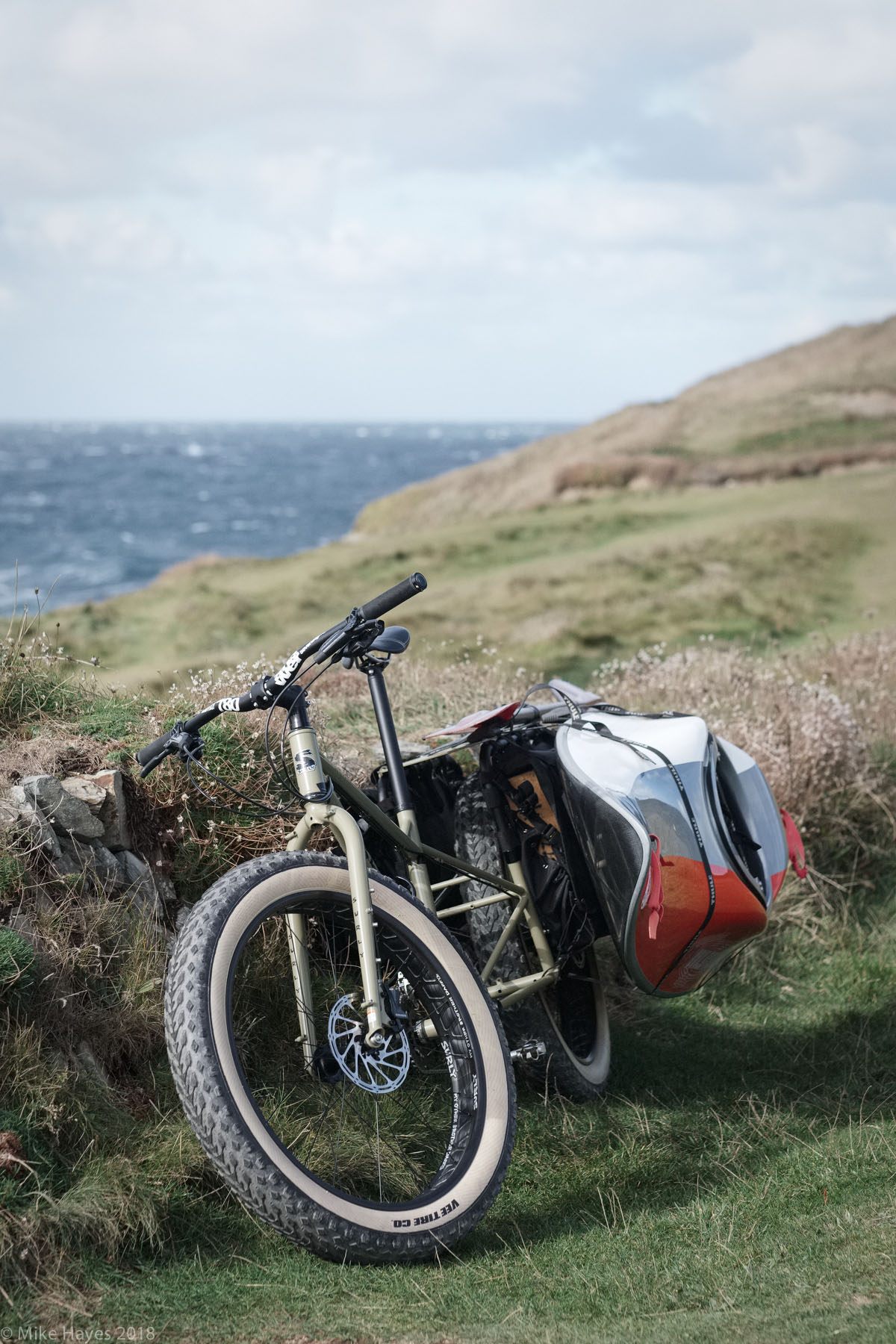 Surly Big Fat Dummy carrying a surf kayak