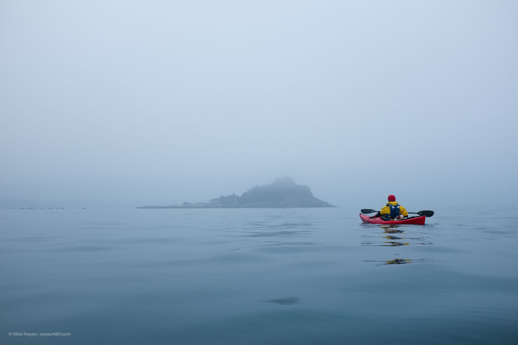 sea kayaker in Mounts Bay with St Michael's Mount