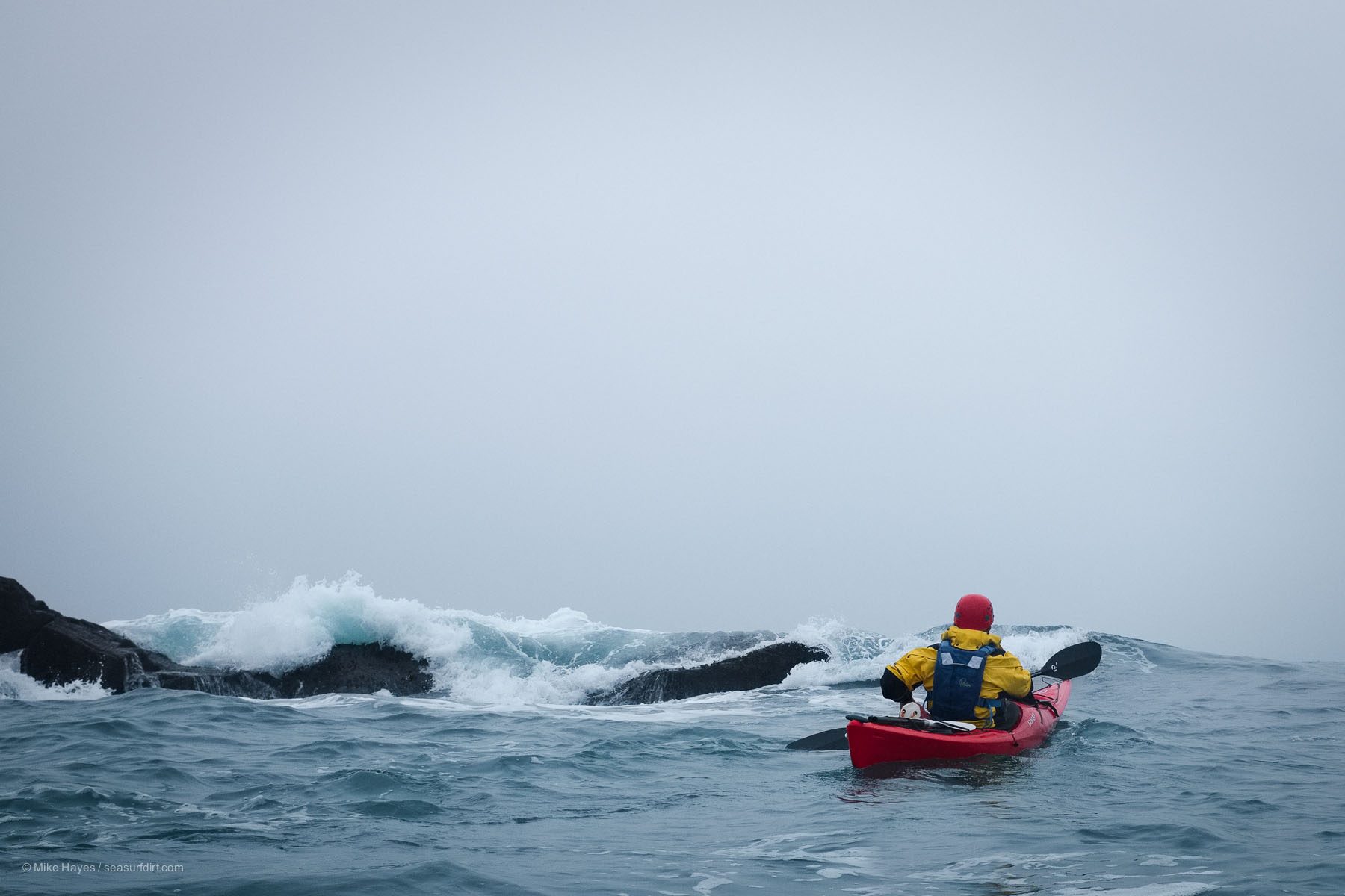 Sea kayaking in rough winter weather in Cornwall