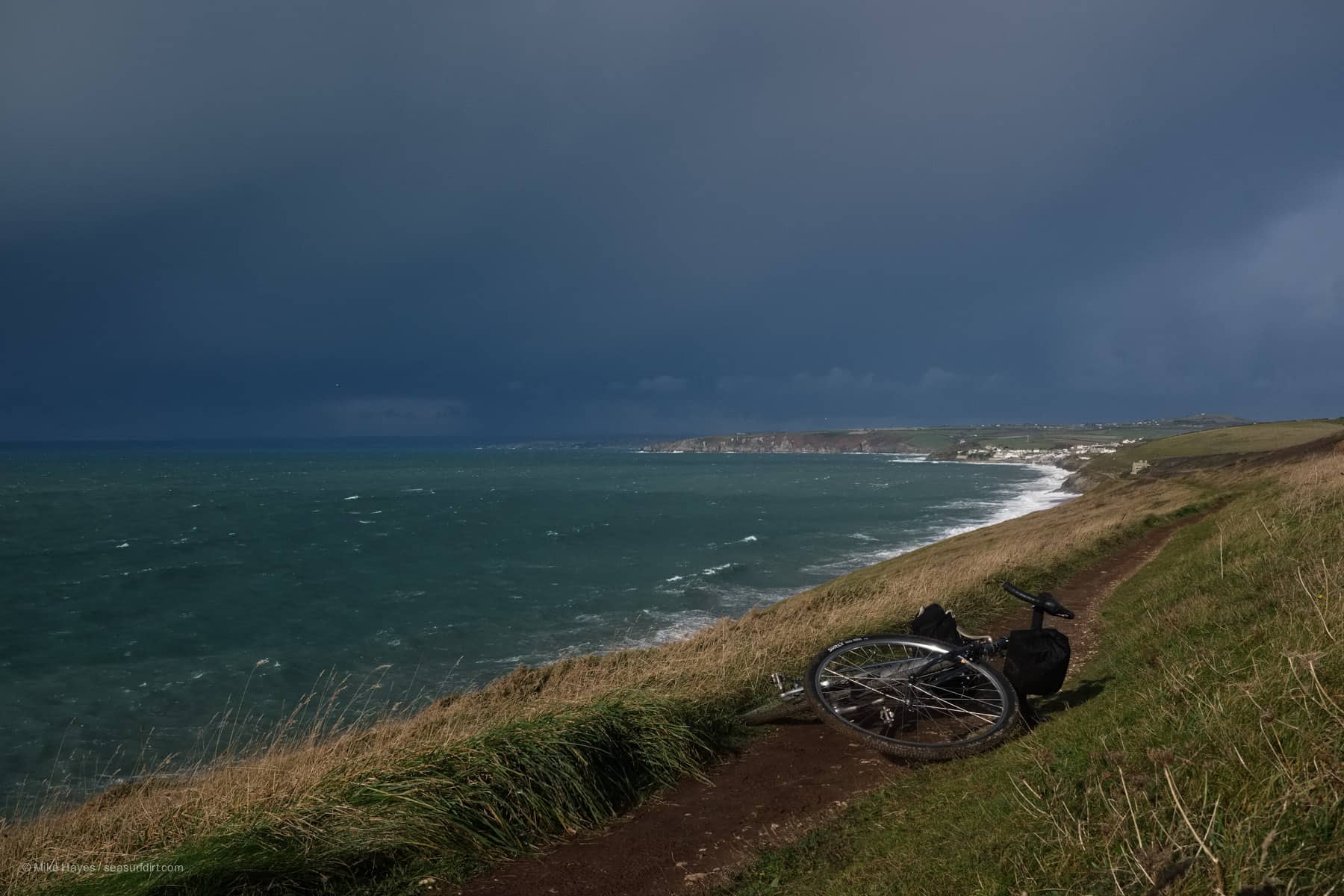 cycling the coast of Cornwall - stormy skies facing west