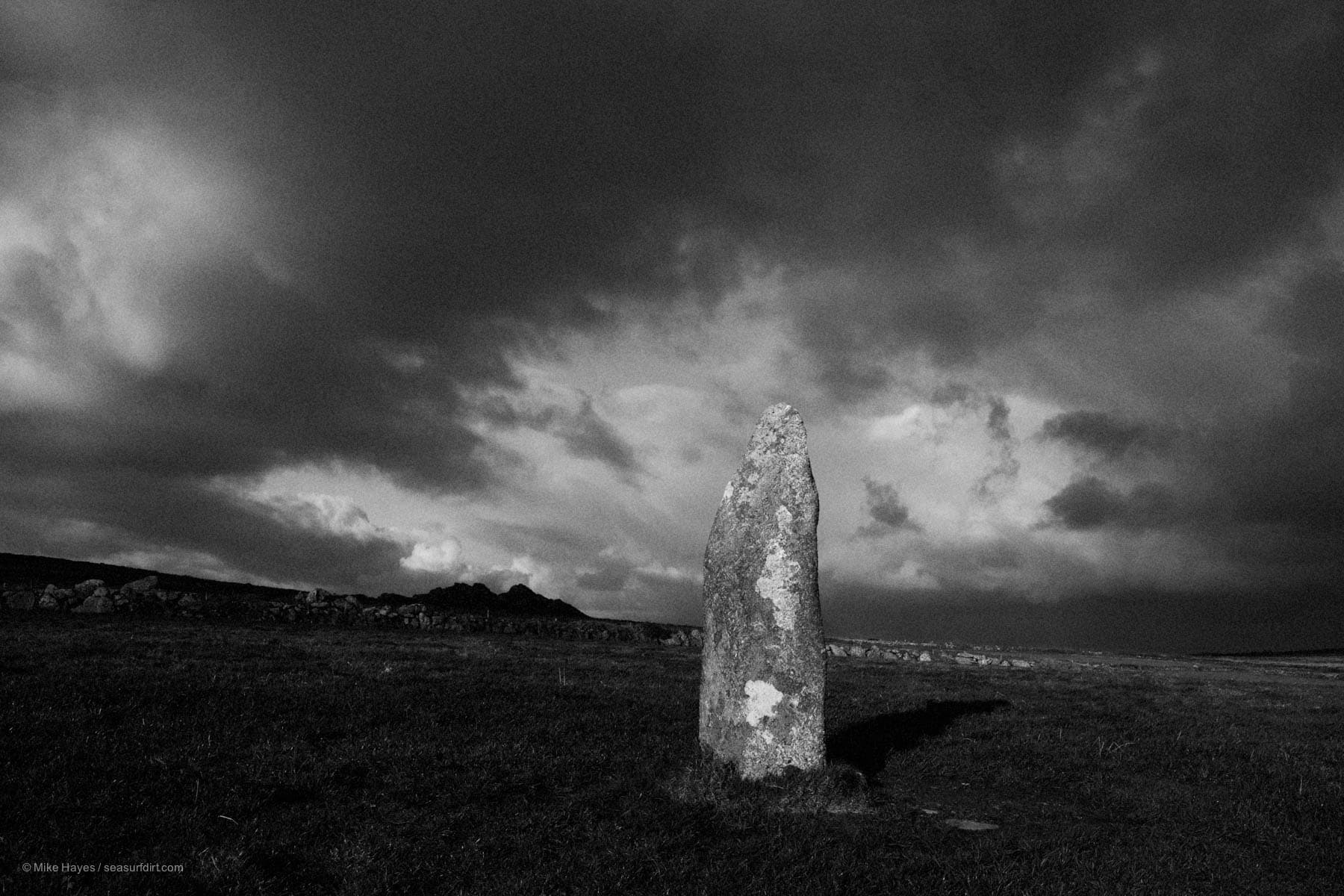 Mên Scryfa standng stone on a stormy day