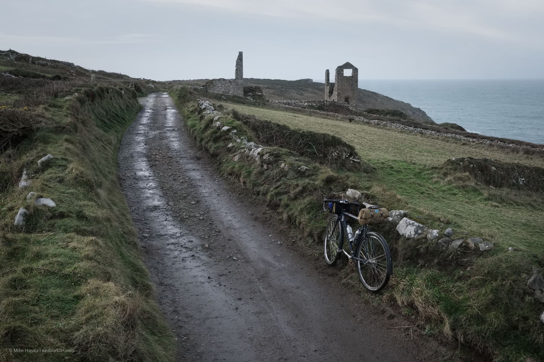 cycling a track past mining ruins